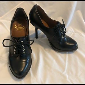 SIZE 9.  Dr. Martens— high heels